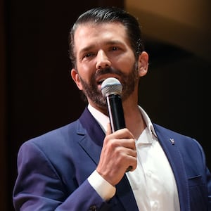 Donald Trump, Jr. gestures as he speaks at the University of Florida.