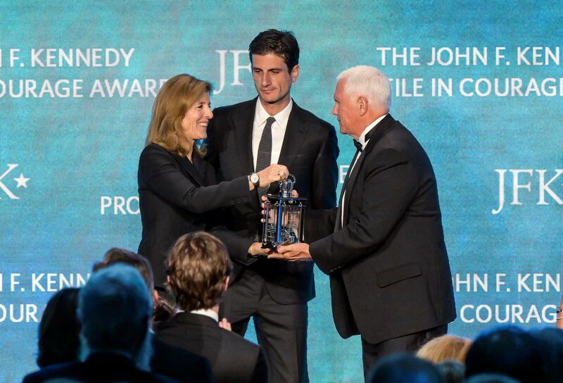 Caroline Kennedy Schlossberg and her son Jack Schlossberg present the 2025 John F. Kennedy Profile in Courage Award to former U.S. Vice President Mike Pence, "for putting his life and career on the line to ensure the constitutional transfer of presidential power on January 6, 2021," at the John F. Kennedy Presidential Library and Museum in Boston, Massachusetts, U.S., May 4, 2025.    REUTERS/Faith Ninivaggi