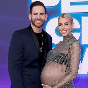 Tarek El Moussa and Heather Rae El Moussa attends the 2022 People's Choice Awards at Barker Hangar on December 06, 2022 in Santa Monica, California.