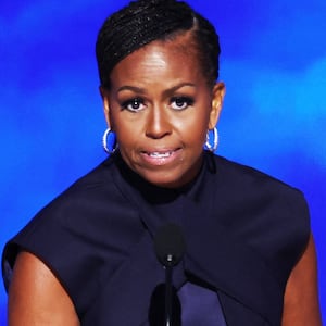 Former U.S. first lady Michelle Obama speaks during Day 2 of the Democratic National Convention (DNC) in Chicago, Illinois, U.S., August 20, 2024. REUTERS/Mike Segar