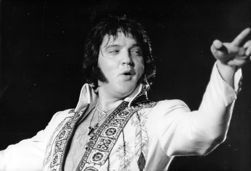 Elvis Presley in concert circa 1977.