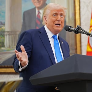 WASHINGTON, DC - MARCH 28: U.S. President Donald Trump announces that his administration has reached a deal with elite law firm Skadden, Arps, Slate, Meagher & Flom during a swearing-in ceremony in the Oval Office at the White House on March 28, 2025 in Washington, DC. Trump hosted the swearing in of his former personal attorney and White House Presidential counselor Alina Habba as interim U.S. Attorney in New Jersey. (Photo by Andrew Harnik/Getty Images)