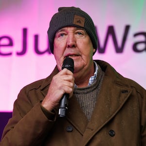 LONDON, ENGLAND - NOVEMBER 19: TV presenter Jeremy Clarkson speaks to the crowd during a farmers demonstration on Whitehall on November 19, 2024 in London, England. Thousands of farmers descended on central London to protest against changes to inheritance tax announced in the budget last month. The farmers argue that the changes will destroy family farms and that the nation's food security is at risk, while the government says that the change will likely affect only around 500 larger estate farms. (Photo by Dan Kitwood/Getty Images)