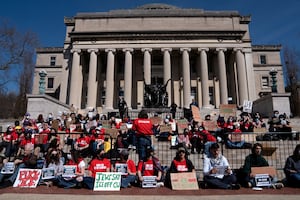 Students stage a walk-out protest at Columbia University’s Low Library steps to condemn the presence of U.S. Immigration Customs Enforcement (ICE) agents on campus