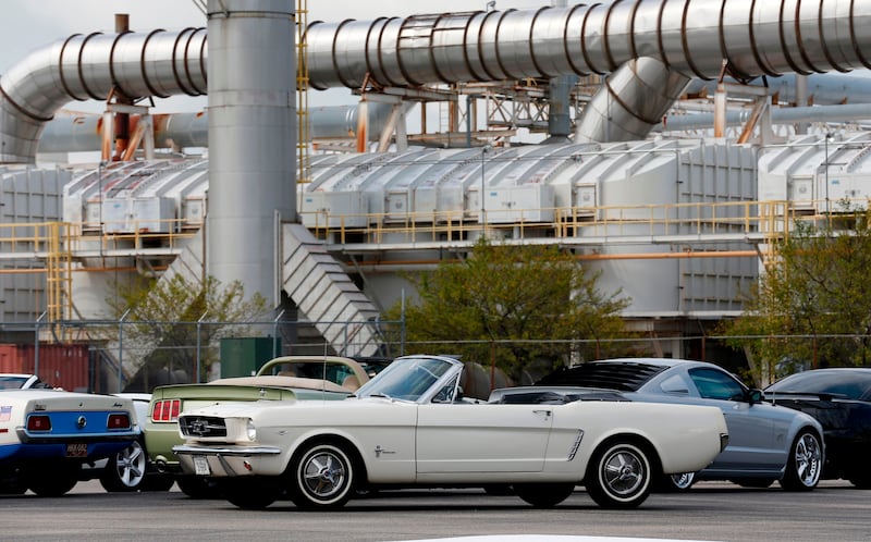 The first Ford Motor's  Mustang produced is seen, as they celebrate the production of the 10 millionth vehicle outside the Flat Rock Assembly on August 8, 2018 in Flat Rock, Michigan. - The Ford Mustang -- an iconic American brand and a symbol of cool -- reached a major milestone Wednesday as the 10 millionth vehicle rolls off an assembly line at a Detroit-area plant. Ford marked the occasion for the car, celebrated in American song and film and recognized the world over as a quintessentially American cultural export, with a big party and parade at the Michigan headquarters. (Photo by JEFF KOWALSKY / AFP)        (Photo credit should read JEFF KOWALSKY/AFP via Getty Images)