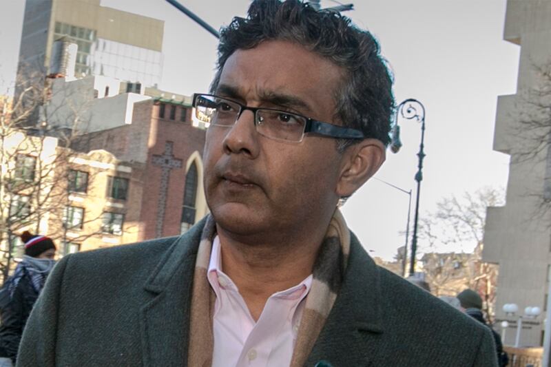 articles/2014/01/27/d-souza-s-never-ending-right-wing-hustle/140127-dinesh-dsouza-bouie-tease_jkum9t