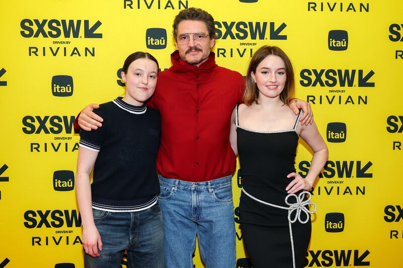 (L-R) Bella Ramsey, Pedro Pascal, and Kaitlyn Dever arrive at "The Last of Us: Cast and Creators on season 2" panel during SXSW at Austin Convention Center on March 08, 2025 in Austin, Texas.