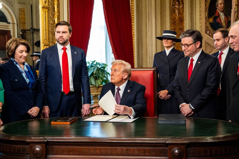 President Donald Trump, center, speaks to Congressional leadership in the White House.