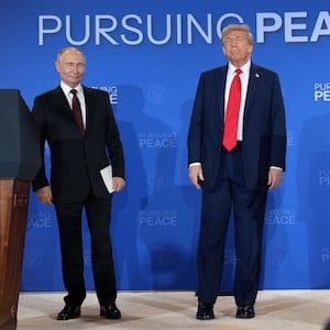 President Donald Trump (R) and Russian President Vladimir Putin leave following a press conference at Joint Base Elmendorf-Richardson on August 15, 2025 in Anchorage, Alaska.