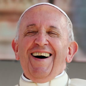 Pope Francis laughs
