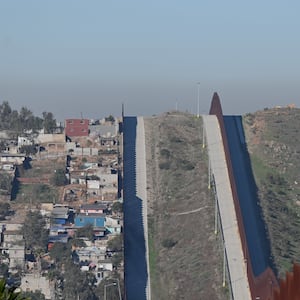 The US-Mexico border fence is in eastern Tijuana, Baja California, Mexico, on February 26, 2025. The government of Mexico sends troops to the northern border with the United States in early February as part of a 10,000-member deployment operation to tighten measures against illegal migration and cross-border drug smuggling.