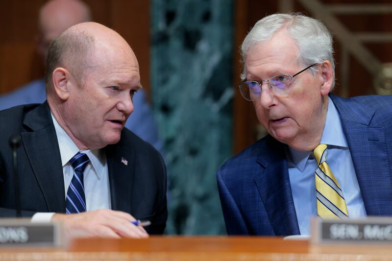 Democratic Sen. Chris Coons (left) and Republican Subcommittee Chairman Sen. Mitch McConnell (right) both raised fierce criticism of the Trump administration's response to Ukraine and questioned whether Vladimir Putin actually wanted a deal.