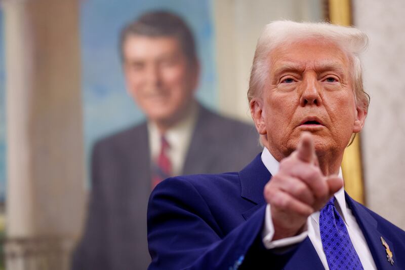 U.S. President Donald Trump takes a question from a reporter at the White House on February 12, 2025 in Washington, DC.