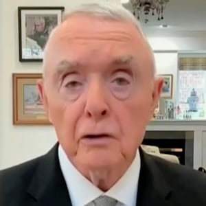 Barry McCaffrey on TV. Tulsi Gabbard shown at Senate Hearing.