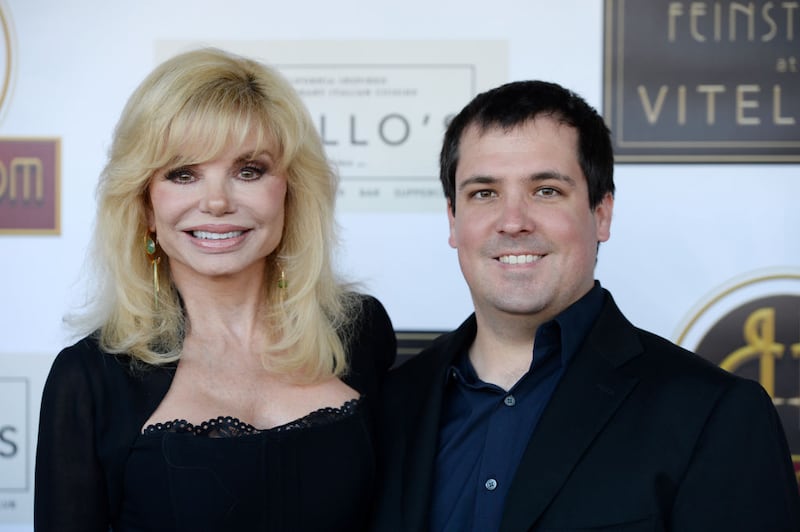 STUDIO CITY, CALIFORNIA - JUNE 13: Loni Anderson and her son Quinton Anderson Reynolds arrive at the debut of the Southern California location of Michael Feinstein's new supper club Feinstein's at Vitello's on June 13, 2019 in Studio City, California. (Photo by Amanda Edwards/Getty Images)