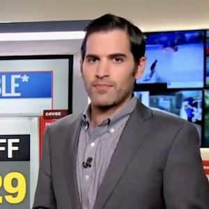 CNN data guru Harry Enten stands left of screen with a set of approval ratings to the right of him showing a dim public view of President Trump's spending proposals.