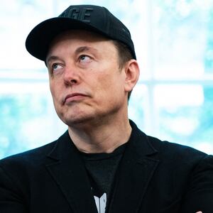 Elon Musk looks on during a news conference with US President Donald Trump in the Oval Office of the White House in Washington, DC, on May 30, 2025. Musk, who stormed into US politics as President Trump's chainsaw-brandishing sidekick, announced on May 28 that he is leaving his role in US government, intended to reduce federal spending, shortly after his first major break with the President over Trump's signature spending bill. (Photo by Allison ROBBERT / AFP) (Photo by ALLISON ROBBERT/AFP via Getty Images)