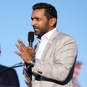 MINDEN, NEVADA - OCTOBER 08: Former Chief of Staff to the Department of Defense Kash Patel speaks during a campaign rally at Minden-Tahoe Airport on October 08, 2022 in Minden, Nevada. Former U.S. President Donald Trump held a campaign style rally for Nevada GOP candidates ahead of the state's midterm election on November 8th.  (Photo by Justin Sullivan/Getty Images)