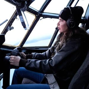 U.S. Homeland Security Secretary Kristi Noem flies an HC-130J aircraft during an aerial tour from U.S. Coast Guard Air Station Kodiak, Monday, March 17, 2025, in Kodiak, Alaska, U.S.     Alex Brandon/Pool via REUTERS
