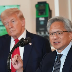 WASHINGTON, DC - APRIL 30: U.S. President Donald Trump (L) listens as Nvidia CEO Jensen Huang speaks in the Cross Hall of the White House during an event on "Investing in America" on April 30, 2025 in Washington, DC. Trump was joined by CEOs to highlight companies and their investments in the United States during the event. (Photo by Andrew Harnik/Getty Images)