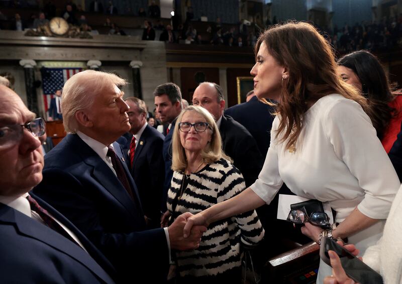 President Donald Trump shakes hands with Rep. Nancy Mace as he leaves after addressing a joint session of Congress