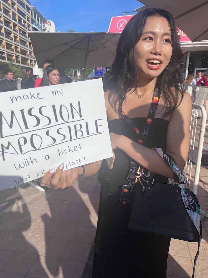 A fan outside the "Mission: Impossible - The Last Reckoning' Cannes premiere