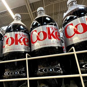Bottles of Diet Coke which use Aspartame, an artificial sweetener set to be listed as a possible cancer risk by WHO. 
