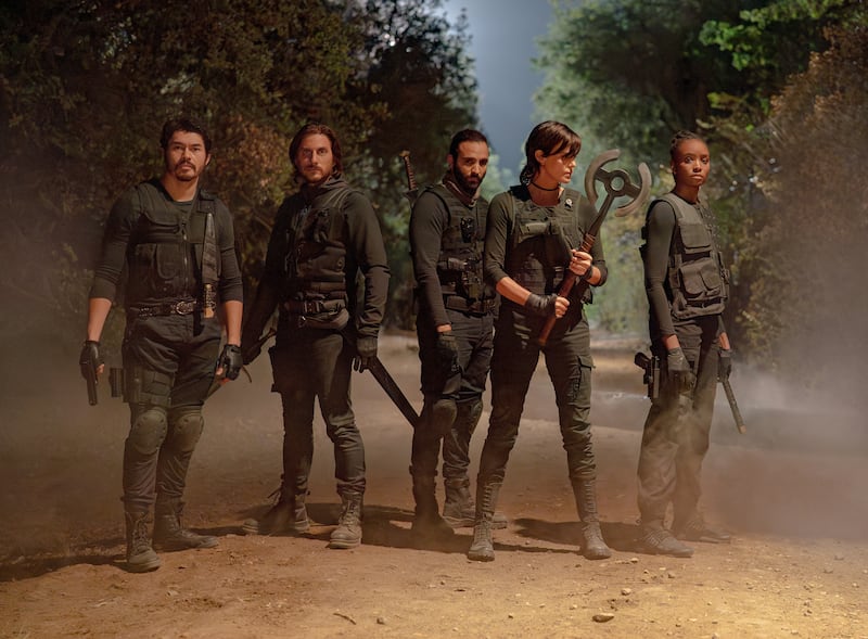 Henry Golding as Tuah, Luca Marinelli as Nicky, Marwan Kenzari as Joe, Charlize Theron as Andy and KiKi Layne as Nile
