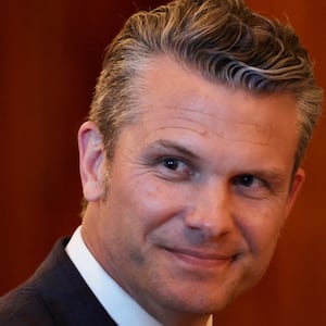 Defense Secretary Pete Hegseth reacts as President Donald Trump speaks during a dinner with Israeli Prime Minister Benjamin Netanyahu at the White House on July 7, 2025.