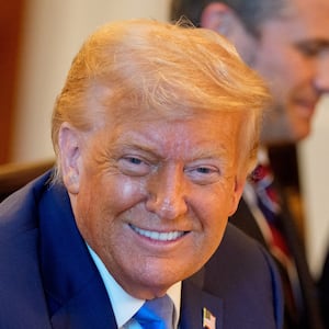 (L-R) Secretary of State Marco Rubio, U.S. President Donald Trump, Defense Secretary Pete Hegseth, and Central Intelligence Agency Director John Ratcliffe, attend a dinner with Israeli Prime Minister Benjamin Netanyahu in the Blue Room of the White House.