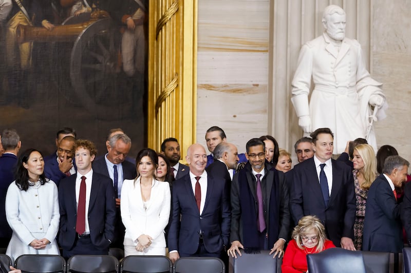 (L-R) Priscilla Chan, Meta CEO Mark Zuckerberg, Lauren Sanchez, businessman Jeff Bezos, Alphabet's CEO Sundar Pichai, and businessman Elon Musk, among other dignitaries, attend the United States Capitol for Trump's inauguration on January 20, 2025 in Washington, D.C.