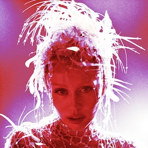 A photo illustration of Miley Cyrus on the cover of Something Beautiful.