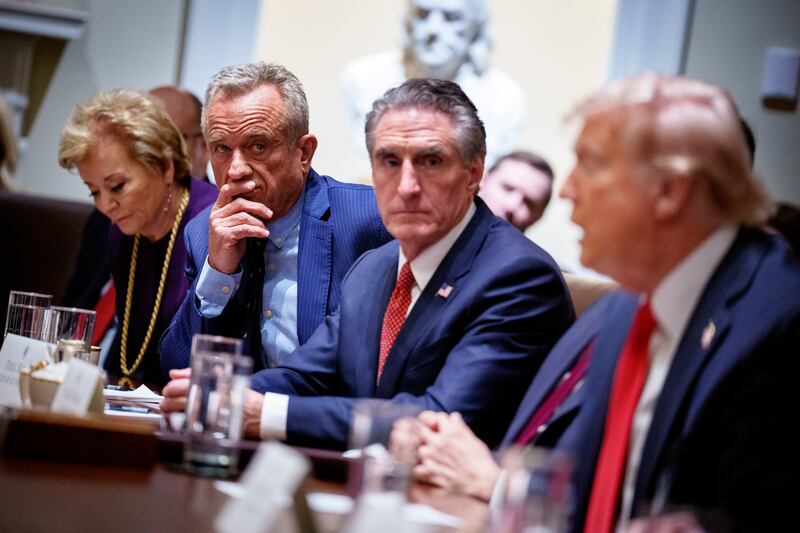 WASHINGTON, DC - FEBRUARY 26: (L-R) U.S. Education Secretary Linda McMahon, U.S. Health and Human Services Secretary Robert F. Kennedy Jr., and Interior Secretary Doug Burgum, appear during a Cabinet meeting at the White House on February 26, 2025 in Washington, DC.