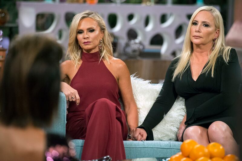 Tamra Judge and Shannon Beador hold hands in support during 2017's Reunion.