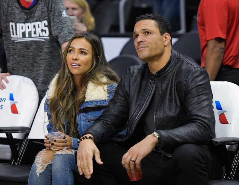Tony Gonzalez (R) and wife October Gonzalez.
