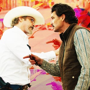 A photo illustration of Joaquin Phoenix and Pedro Pascal in the A24 film "Eddington."