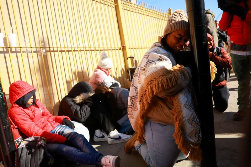 Margelis Tinoco, a migrant from Colombia, reacts after receiving news that her U.S. Customs and Border Protection (CBP) 
One appointment was cancelle