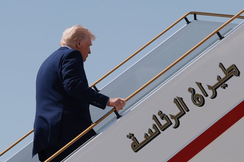 President Donald Trump boards Air Force One as he departs the Al Bateen Executive Airport on May 15, 2025, in Abu Dhabi, United Arab Emirates. He was unable to broker a peace deal between Ukraine and Russia.