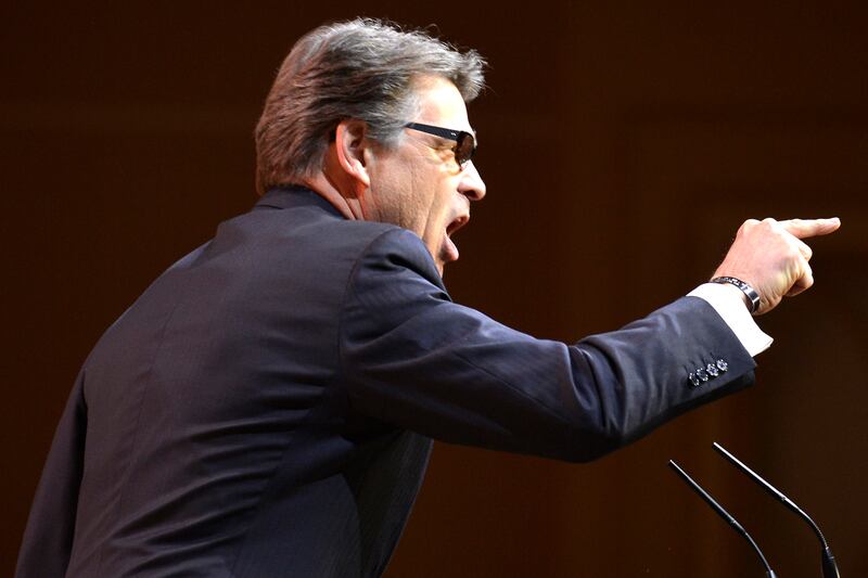 articles/2014/04/24/rick-perry-is-coming-for-your-job/140423-freedlander-perry-tease_ppqiv7