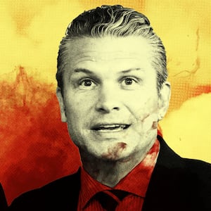 Pete Hegseth and Marco Rubio in between red and yellow smoke