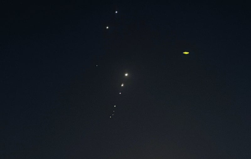 Traces are seen in the sky over Doha, Qatar, after Iran's armed forces targeted the nearby Al-Udeid base.