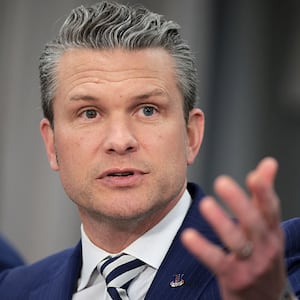 Pete Hegseth, left, and John Ullyot, right