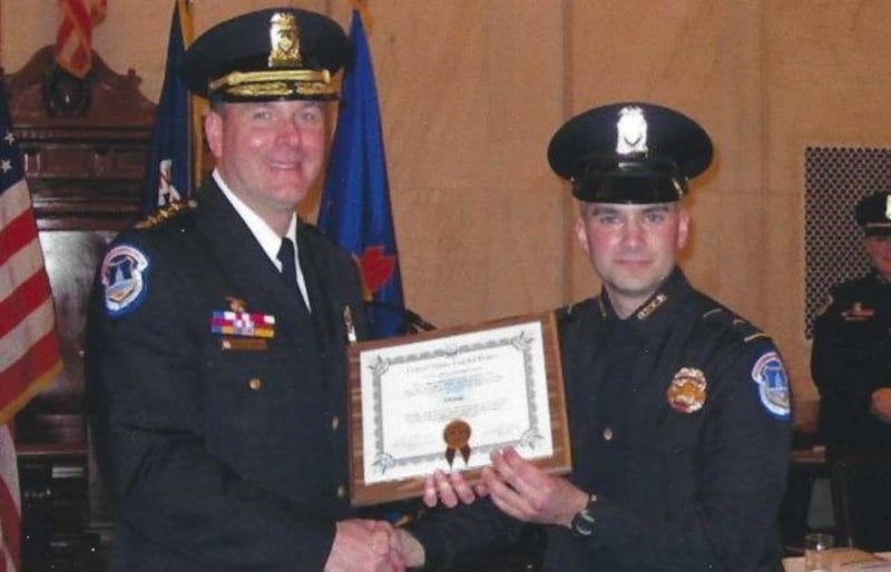 U.S. Capitol Police officer Brian Sicknick receives an award.