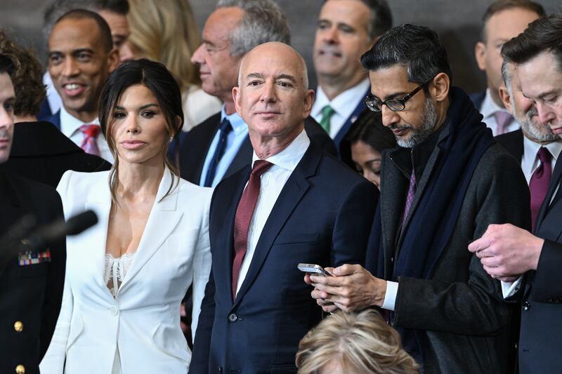 (L-R) Lauren Sanchez, Amazon founder Jeff Bezos, Google CEO Sundar Pichai and Tesla and SpaceX CEO Elon Musk attend the inauguration of U.S. President-elect Donald Trump in the U.S. Capitol Rotunda on January 20, 2025 in Washington, DC.